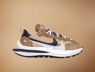 Tan Navy sneakers (Image via StockX)